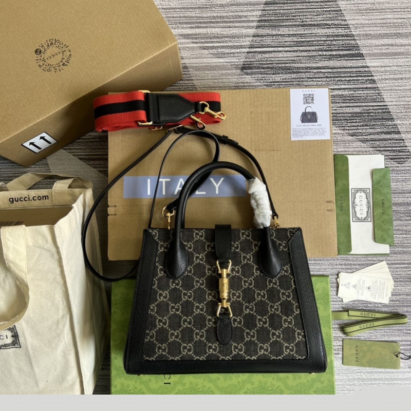 G*u*i top handle bags